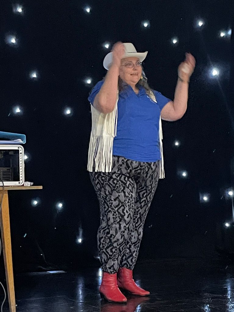 Eileen running a class